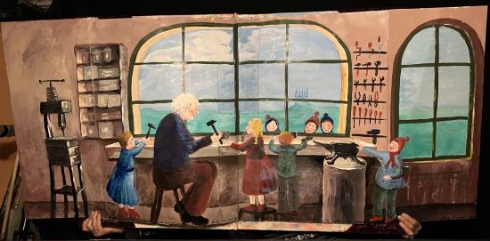 Atelier de fabrication de boîtes à musique, vieil homme et enfants avec de petits marteaux