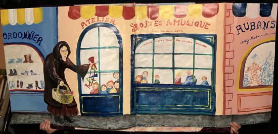 Rue du village, la reine déguisée en bohémienne