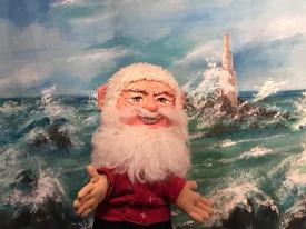 Gardien du phare devant la mer déchaînée, avec le phare en arrière-plan