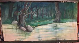 Forêt, rivière, arbre tordu avec des rochers devant