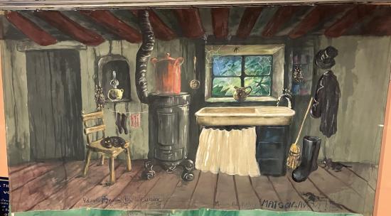 Cuisine avec poêle et toiles d'araignées sur les vitres